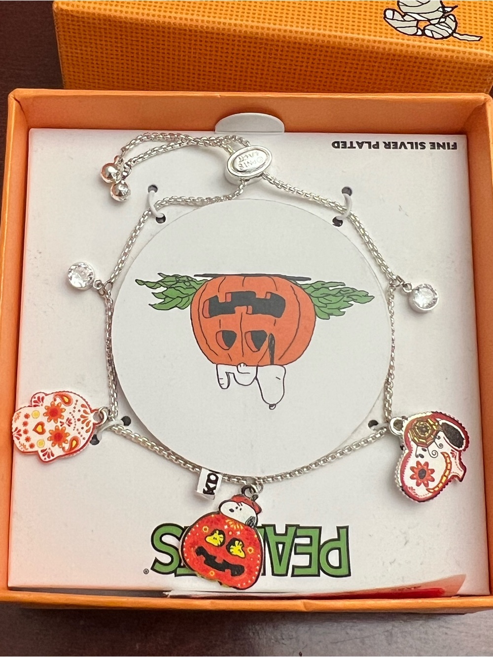 Peanuts Silver-Tone Kids Bracelet with Red and Orange Halloween Charms - Picture 2 of 4
